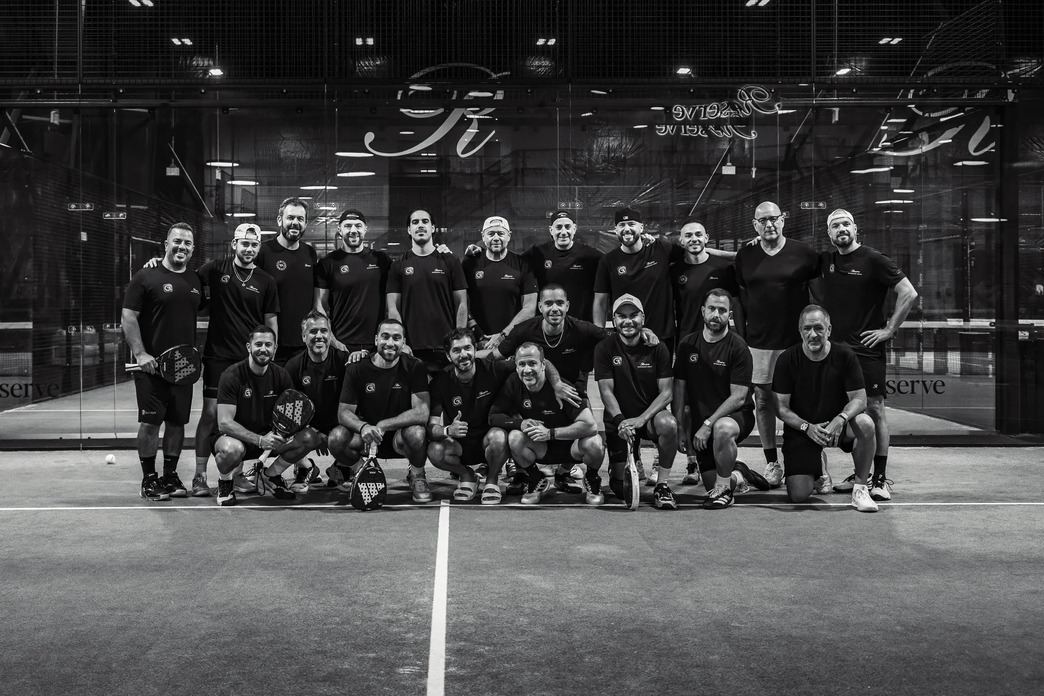 The Reserve Padel team photo in black and white